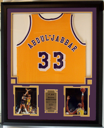 Kareem Abdul Jabbar Autographed Los Angeles Lakers Home Jersey Including  Two 8 x 10 Photograph and Jersey in a 36 x 44 Deluxe Frame Shadow Box